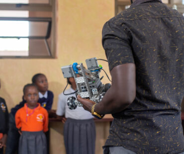 Teacher holding robot